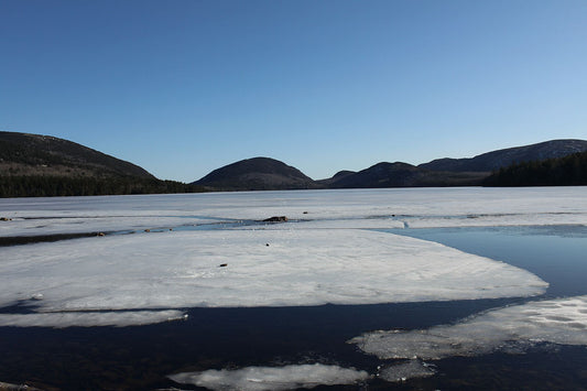 Rock splashing in Acadia lake