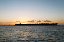 Cargar imagen en el visor de la galería, Sunset over a small island
